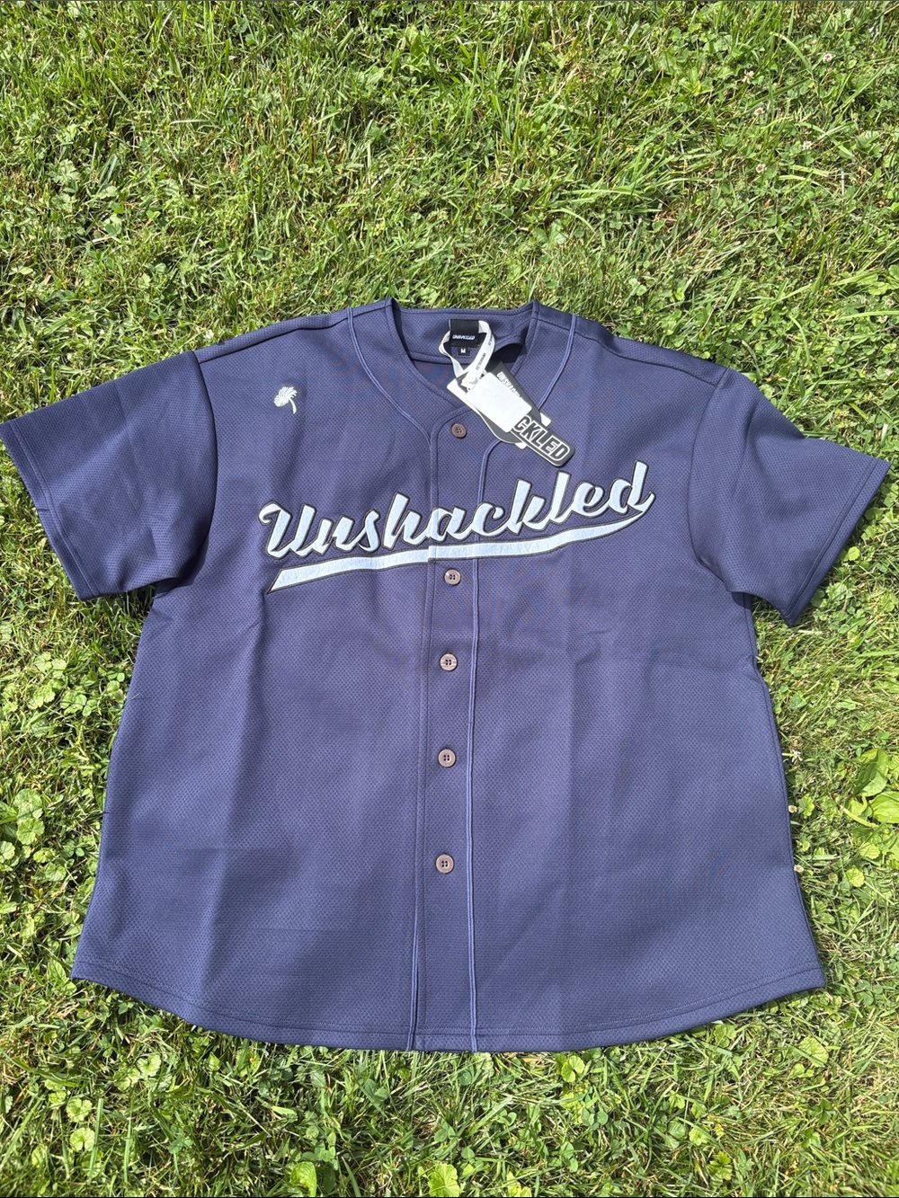 Unshackled Navy Baseball Jersey with White Script Logo